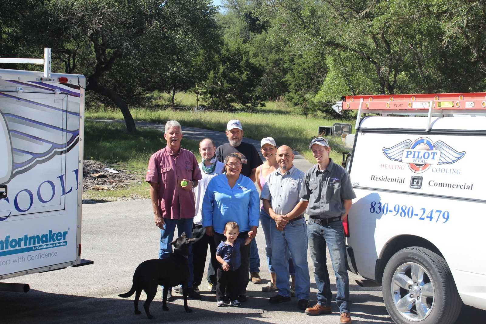 The Pilot Heating and Cooling team gathered outdoors in Spring Branch