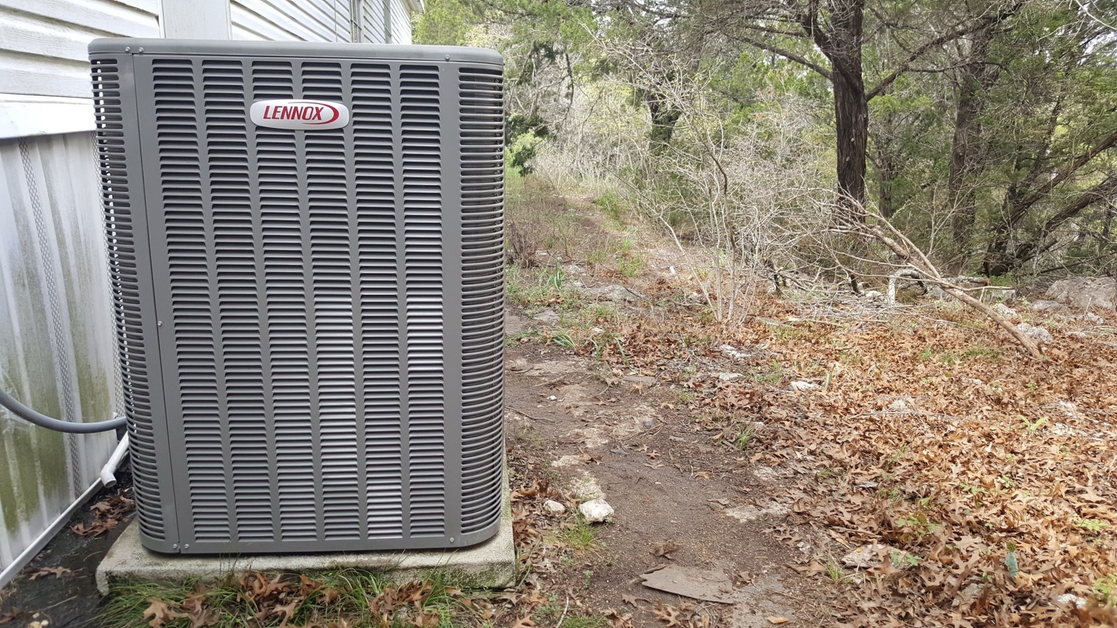 Outdoor condenser unit at a home serviced by Pilot